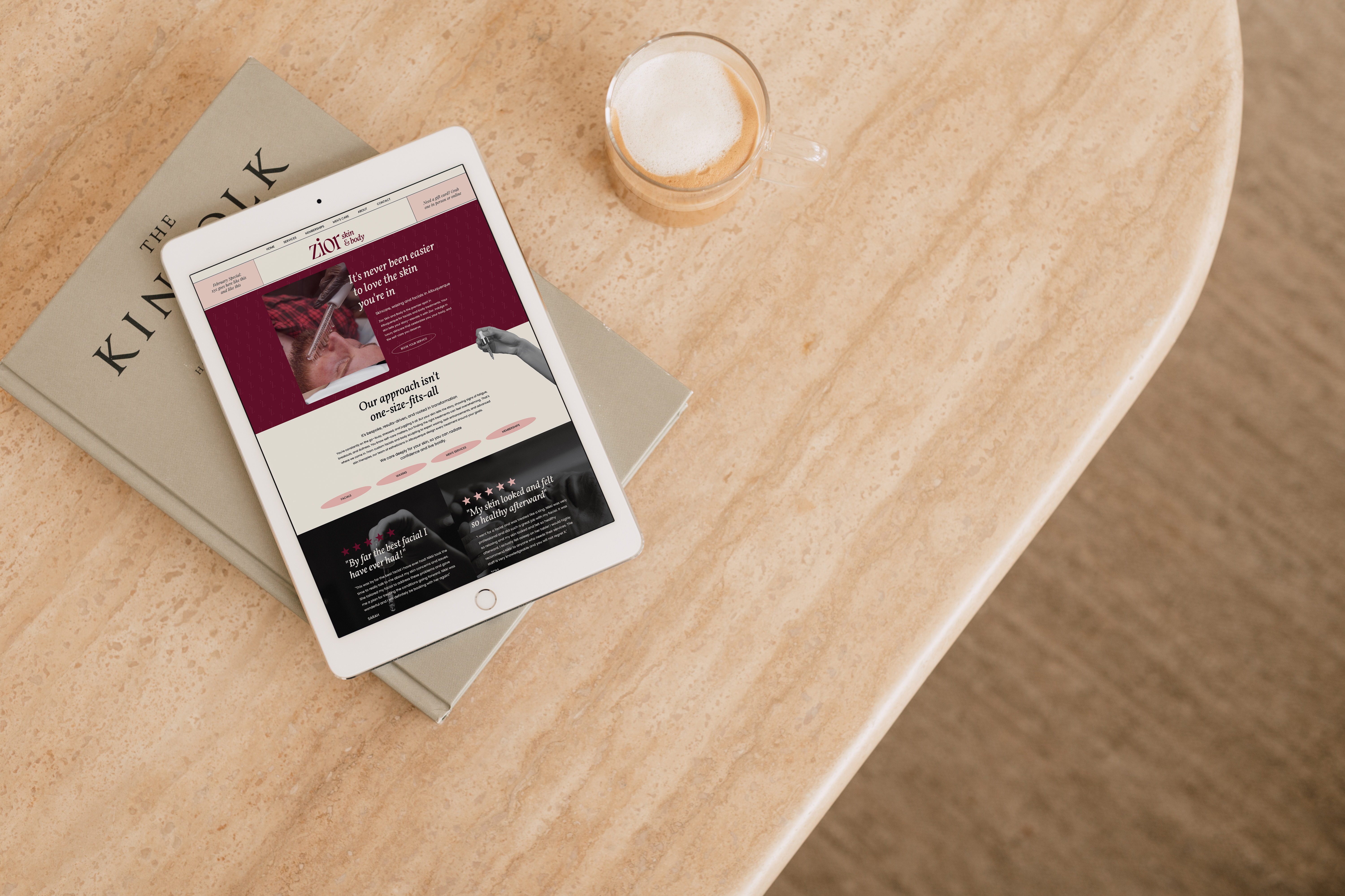 A tablet displaying an esthetician’s website on a table.